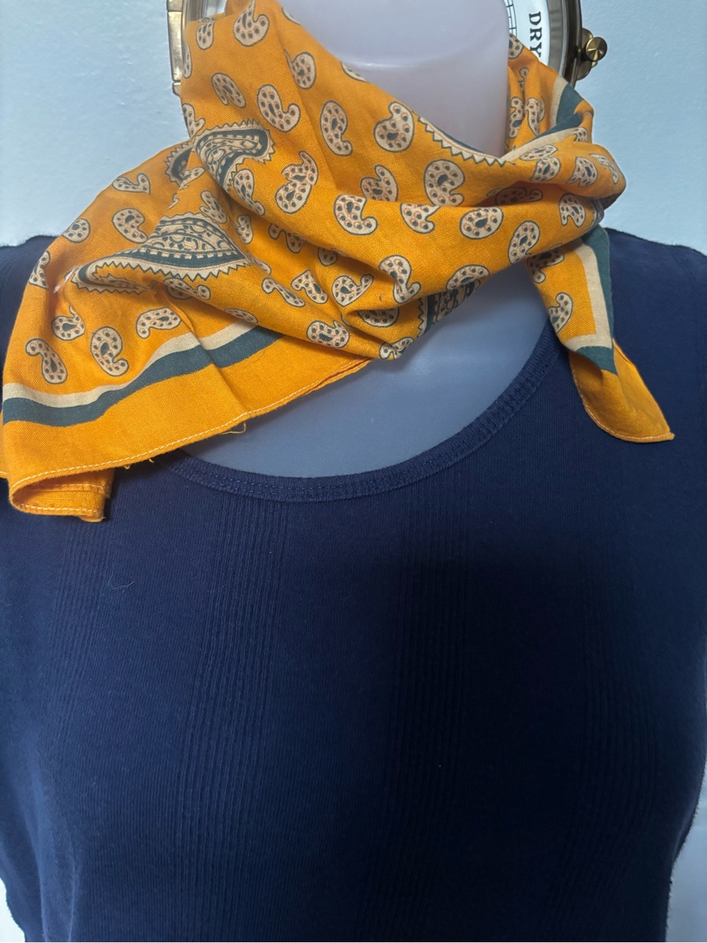 yellow cotton square scarf featuring a classic blue and white paisley pattern